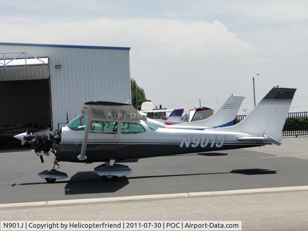 N901J, 1969 Cessna 172K Skyhawk C/N 17258779, Engine cowling removed and engine being worked on a Howard Aviation