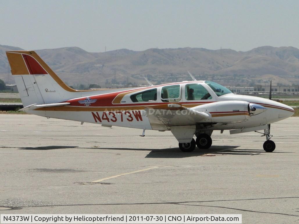 N4373W, 1974 Beech 95-B55 (T42A) Baron C/N TC-1696, Parked south and east of the tower