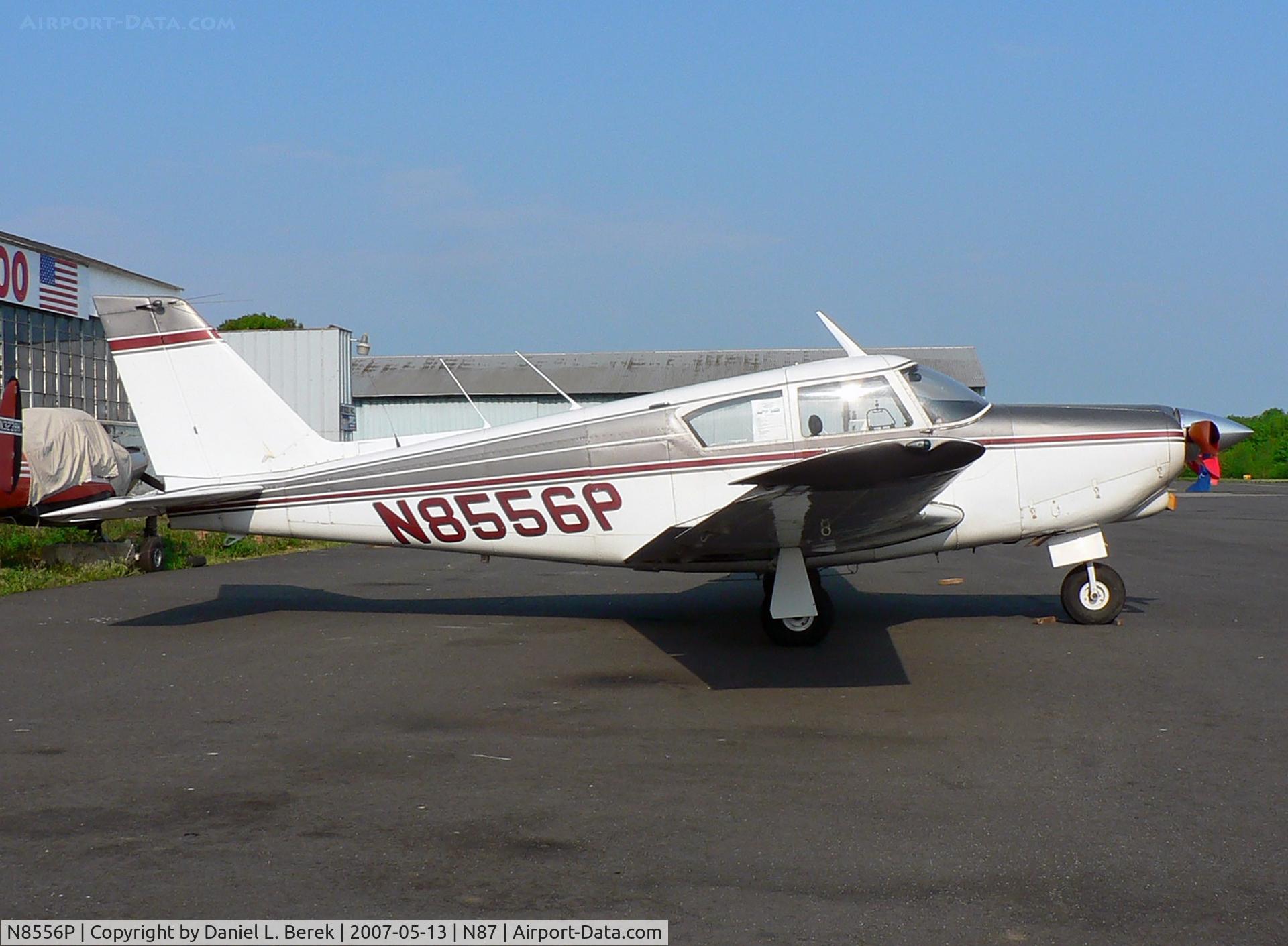 N8556P, 1964 Piper PA-24-260 Comanche B C/N 24-4013, Beautiful classic 1964 Commanche behind the hangar at Robbinsville
