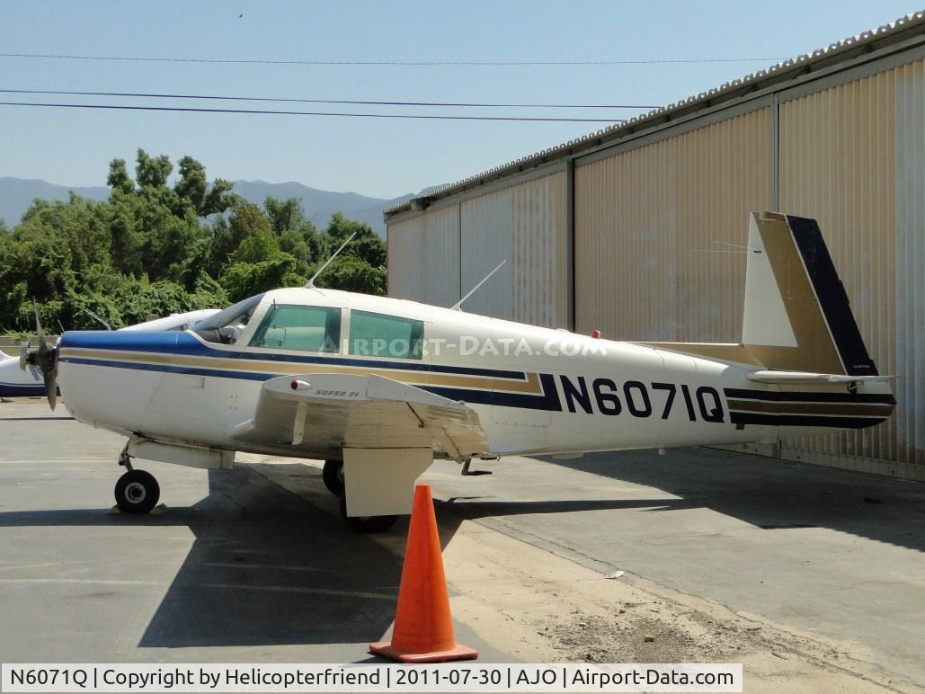 N6071Q, 1965 Mooney M20E C/N 900, Parked by the hanger