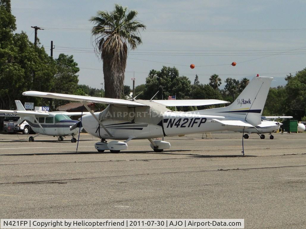 N421FP, 1998 Cessna 172R C/N 17280638, Sky Hawk tied down and covered up