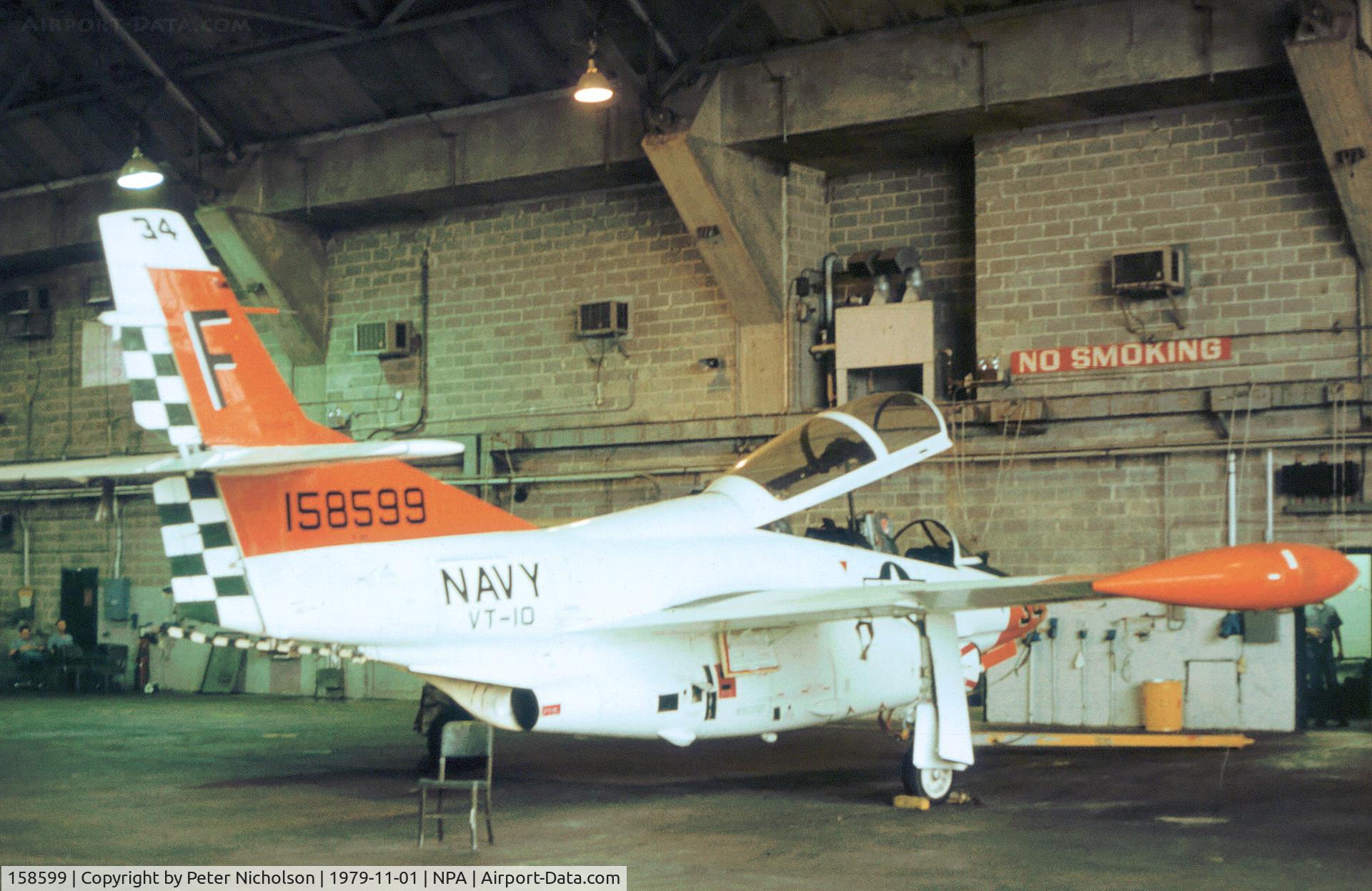 158599, Rockwell T-2C Buckeye C/N 346-25, T-2C Buckeye of Training Squadron VT-10 undergoing maintenance at NAS Pensacola in November 1979.