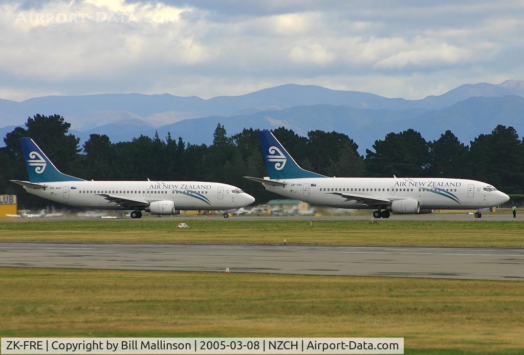 ZK-FRE, 1998 Boeing 737-3U3 C/N 28742, with ZK-NGF in the background