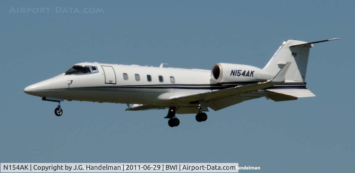 N154AK, 1997 Learjet Inc 60 C/N 114, on final to 33L