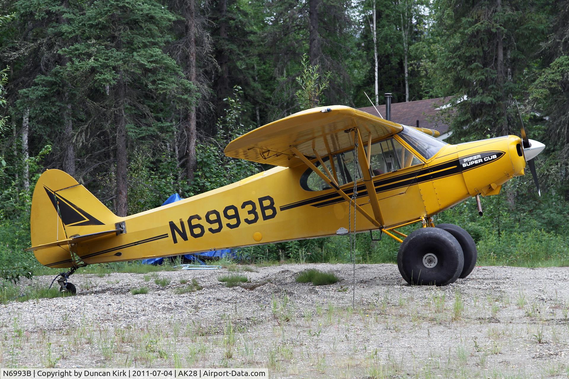 N6993B, 1956 Piper PA-18-150 Super Cub C/N 18-5115, Many houses on this field set back from the runway have planes in their front yards!
