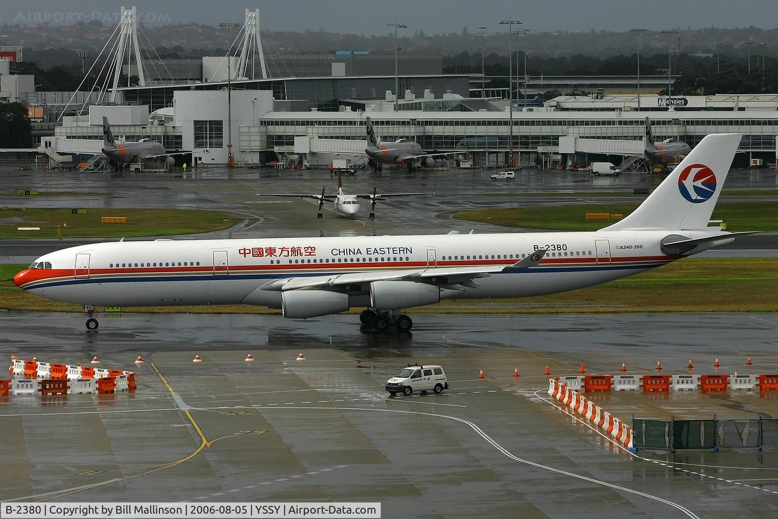 B-2380, 1996 Airbus A340-313 C/N 129, taxiing to 16R