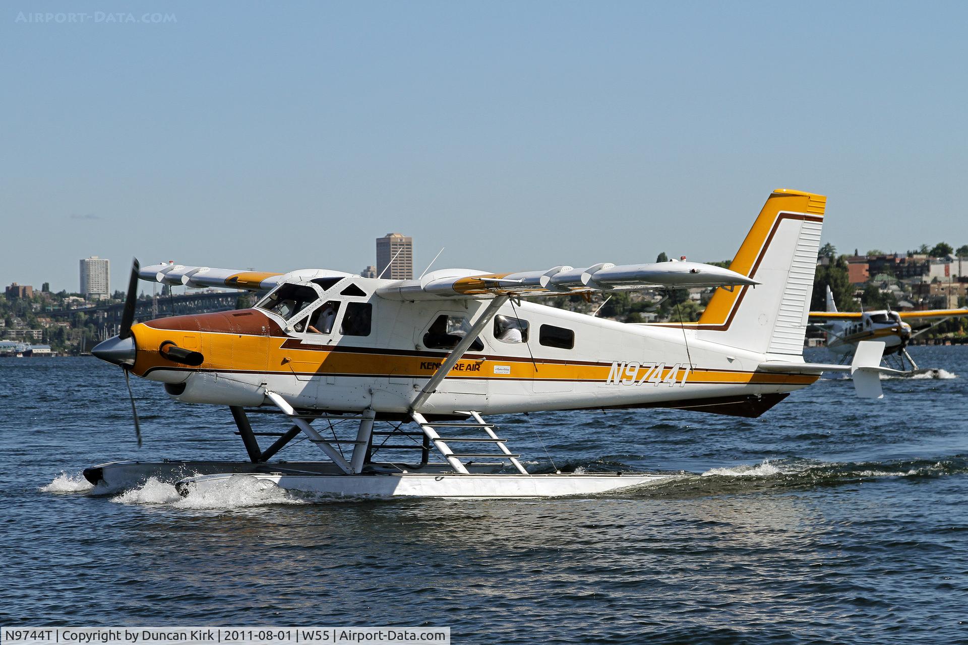N9744T, 1968 De Havilland Canada DHC-2 Beaver Mk.3 C/N 1692, Kenmore Beaver taxiis in to Kenmore Lake Union's facility with a comany Turbo Otter right behind it