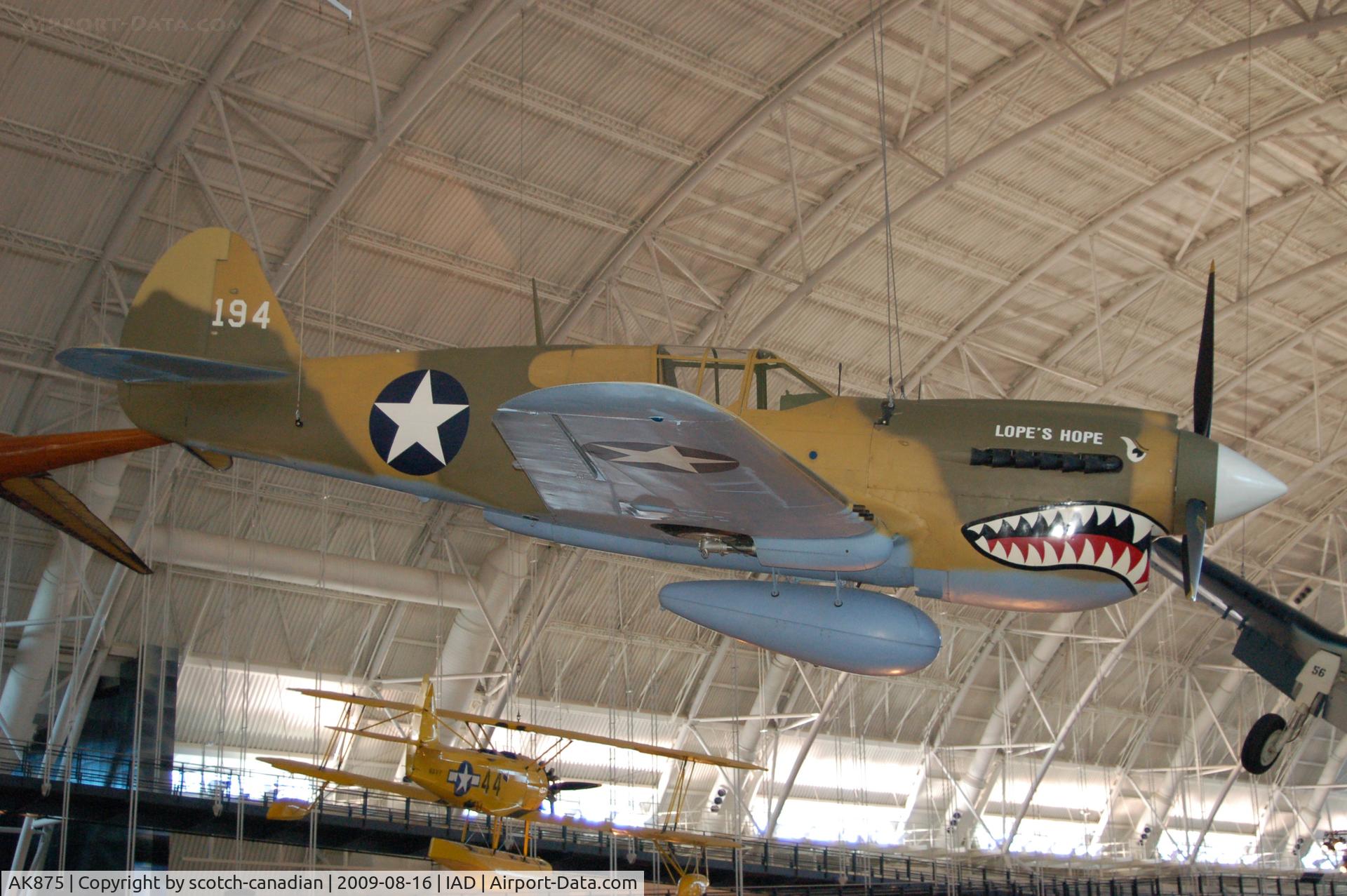 AK875, 1942 Curtiss P-40E Kittyhawk 1A C/N 15349, 1942 Curtiss P-40E Warhawk (Kittyhawk IA) at the Steven F. Udvar-Hazy Center, Smithsonian National Air and Space Museum, Chantilly, VA