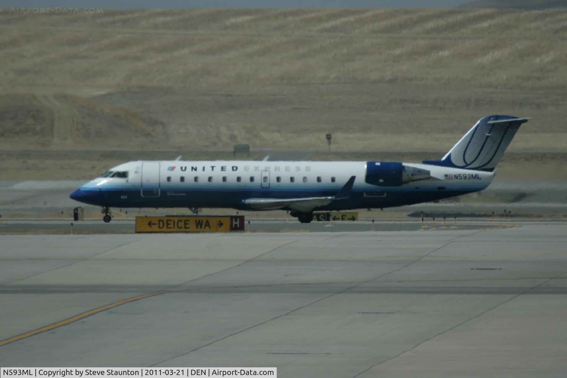 N593ML, 2001 Bombardier CRJ-200ER (CL-600-2B19) C/N 7465, Taken at Denver International Airport, in March 2011 whilst on an Aeroprint Aviation tour
