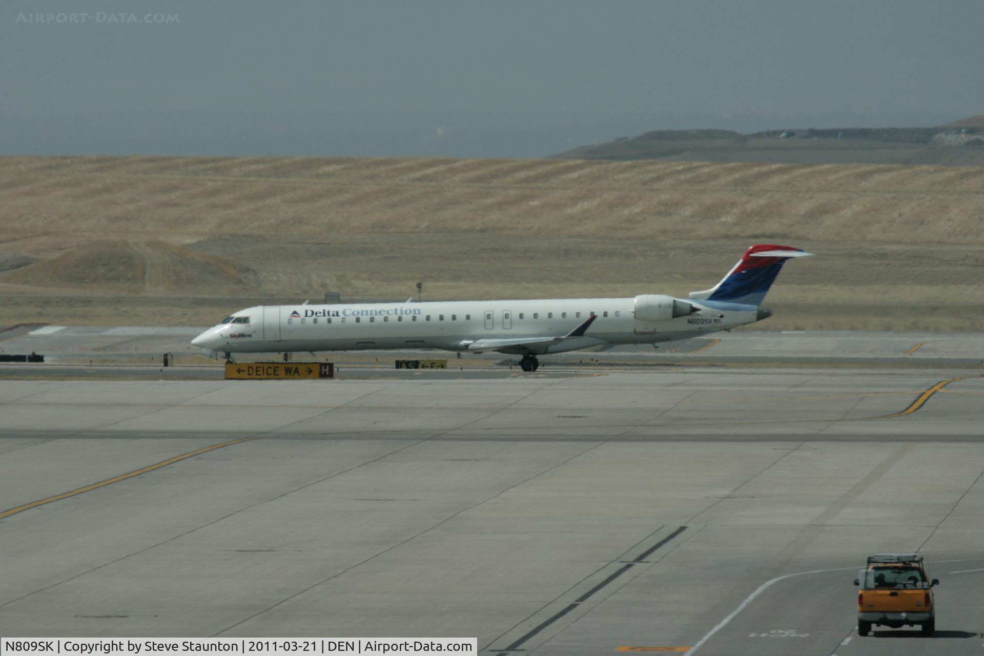 N809SK, 2006 Bombardier CRJ-900ER (CL-600-2D24) C/N 15086, Taken at Denver International Airport, in March 2011 whilst on an Aeroprint Aviation tour