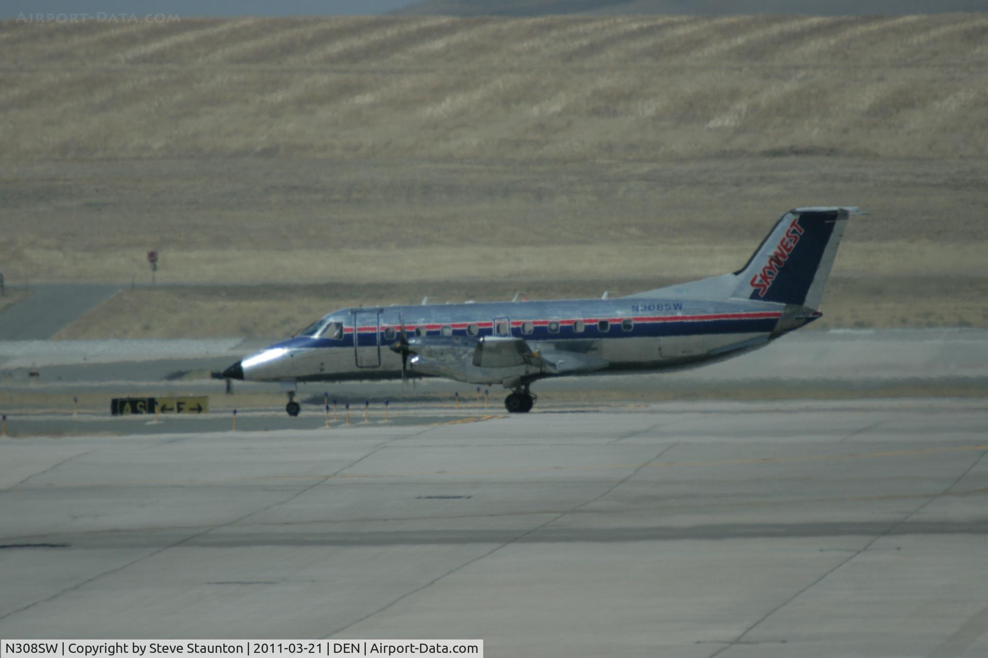 N308SW, 1997 Embraer EMB-120ER Brasilia C/N 120-326, Taken at Denver International Airport, in March 2011 whilst on an Aeroprint Aviation tour