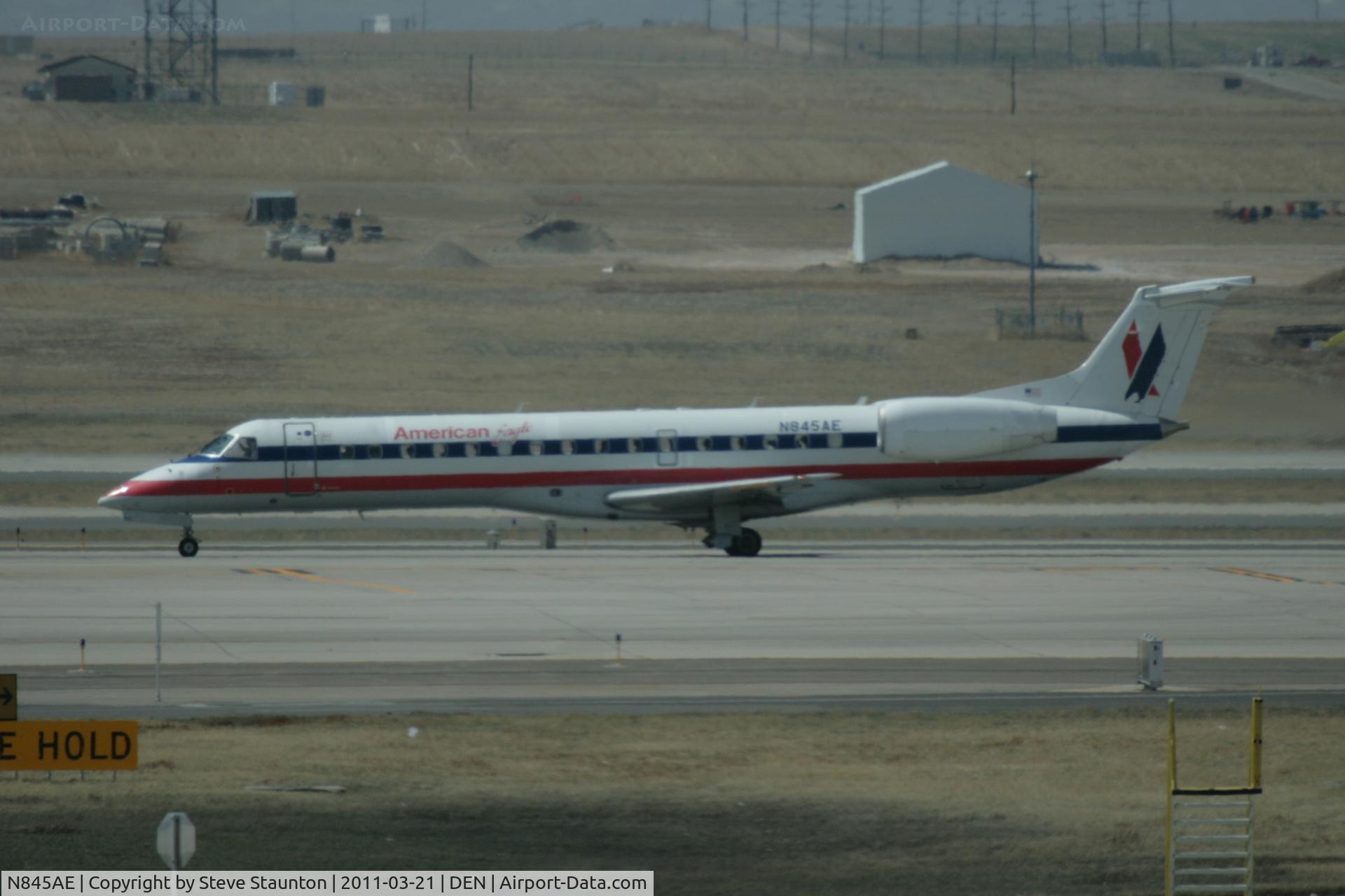 N845AE, 2003 Embraer ERJ-140LR (EMB-135KL) C/N 145685, Taken at Denver International Airport, in March 2011 whilst on an Aeroprint Aviation tour