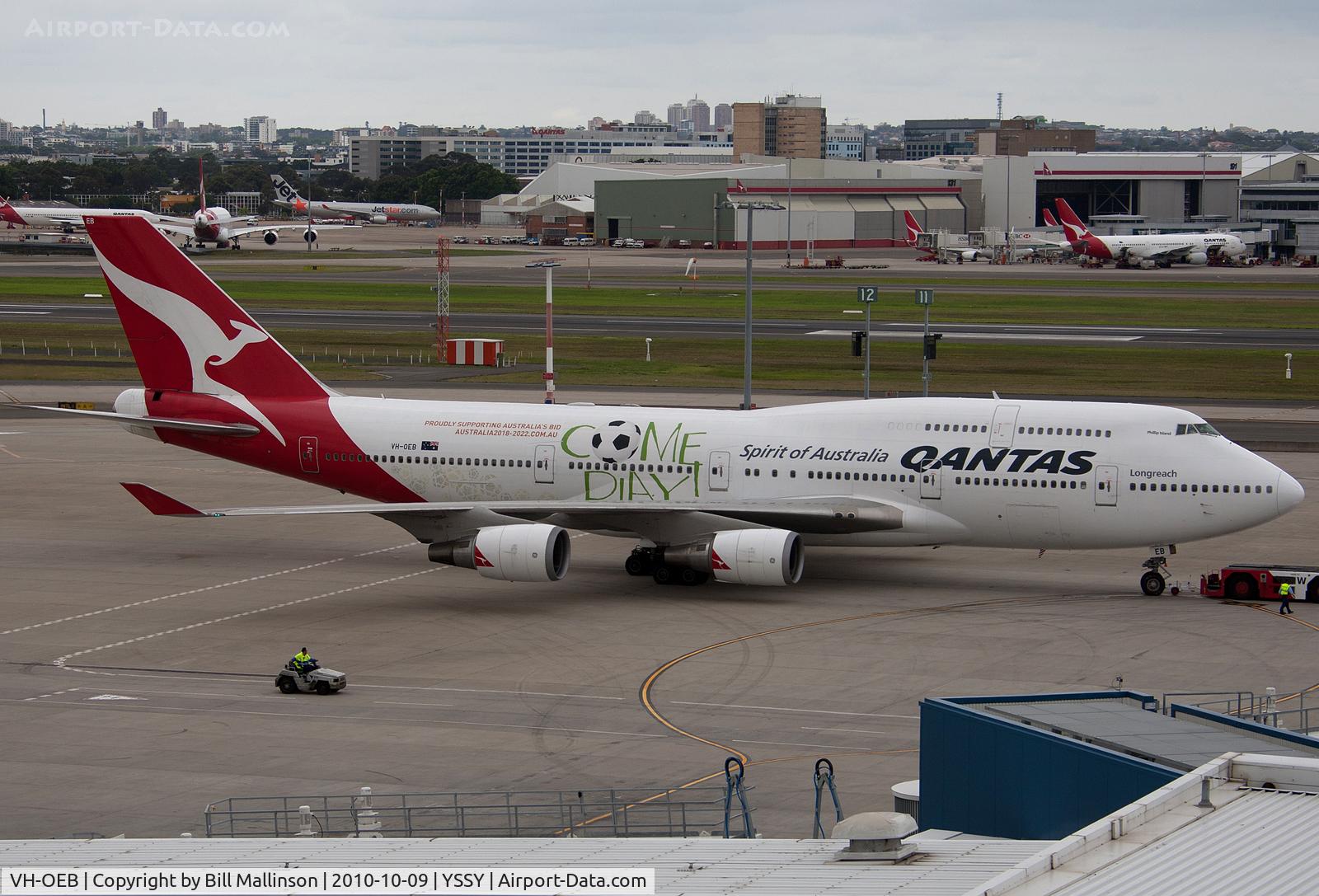 VH-OEB, 1993 Boeing 747-48E C/N 25778, push back