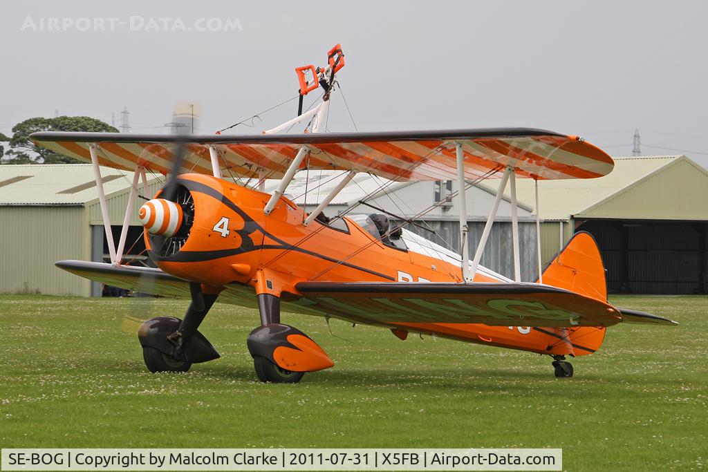 SE-BOG, 1942 Boeing N2S-3 Kaydet (B75N1) C/N 75-7128, Stearman N2S-3 Kaydet taxying to refuel after performing at the 2011 Sunderland Airshow. Fishburn Airfield, July 2011.