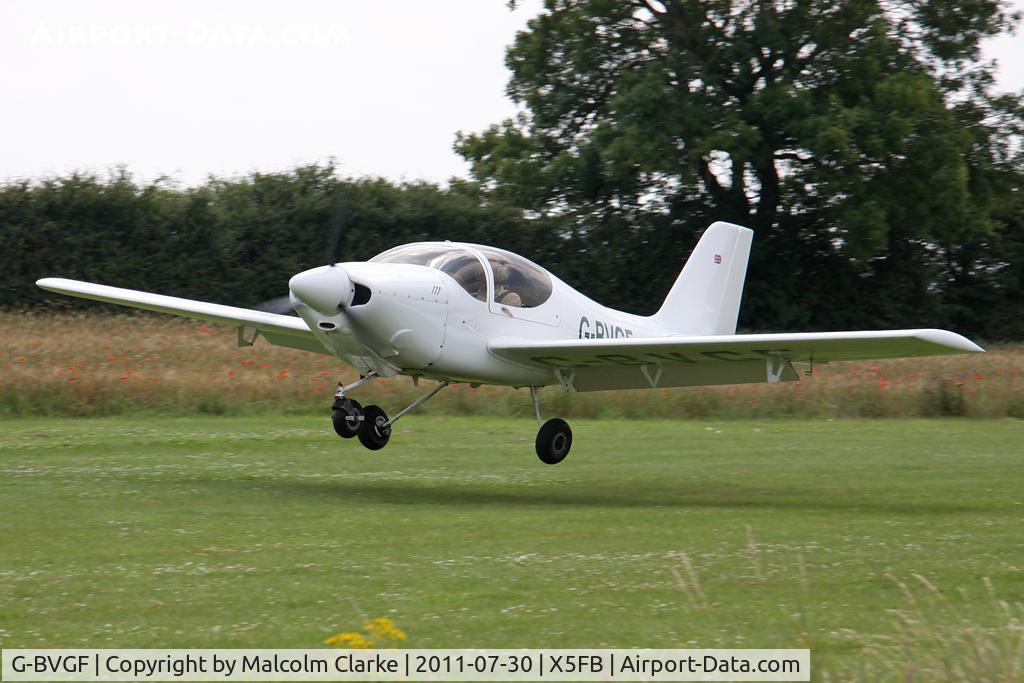 G-BVGF, 1996 Europa Tri-Gear C/N PFA 247-12565, Europa Leaves Fishburn Airfield for Eschott. July 2011.