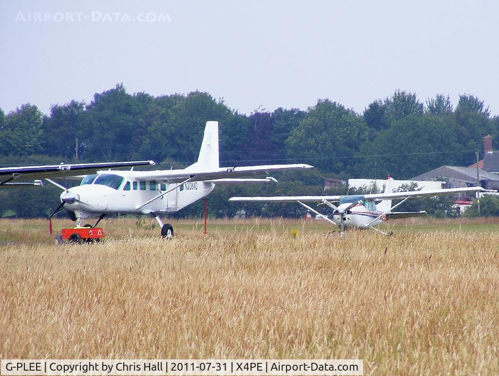 G-PLEE, 1978 Cessna 182Q Skylane C/N 182-66570, alongside N208AD at the Peterlee Parachute Centre based at Shotton airfield.