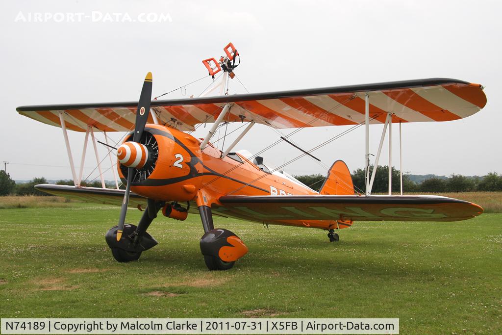 N74189, 1941 Boeing PT-17/R985 Kaydet (A75N1) C/N 75-717, Stearman PT-17, on a refuelling stop following a wing walking appearance at the 2011 Sunderland Airshow - Fishburn Airfield, July 2011.