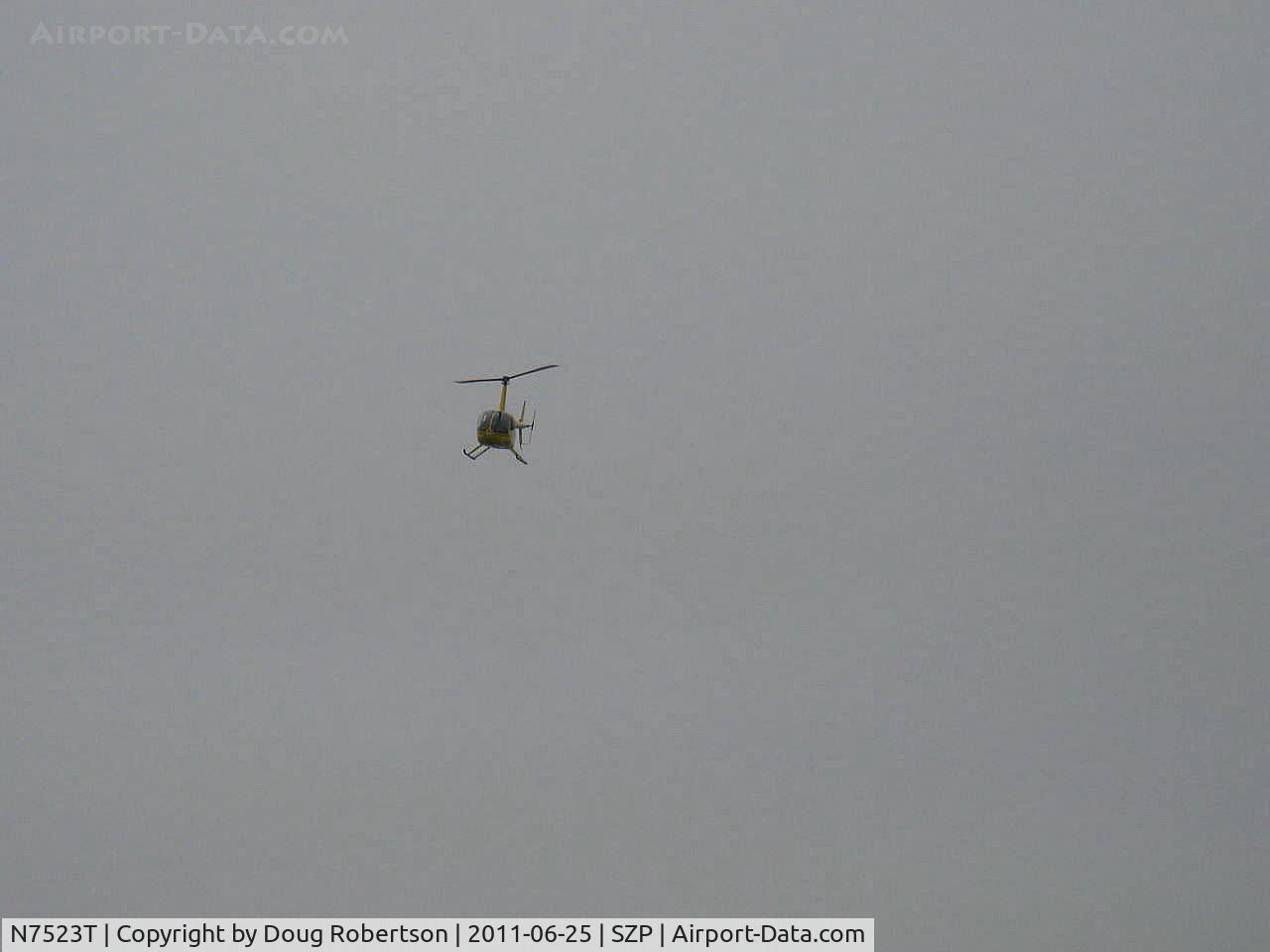 N7523T, 2004 Robinson R44 Raven II C/N 10311, 2004 Robinson R44 RAVEN II, Lycoming IO-540 derated to 245 Hp for 5 minutes, 205 Hp continuous, approaching SZP in low clouds and ground fog over river