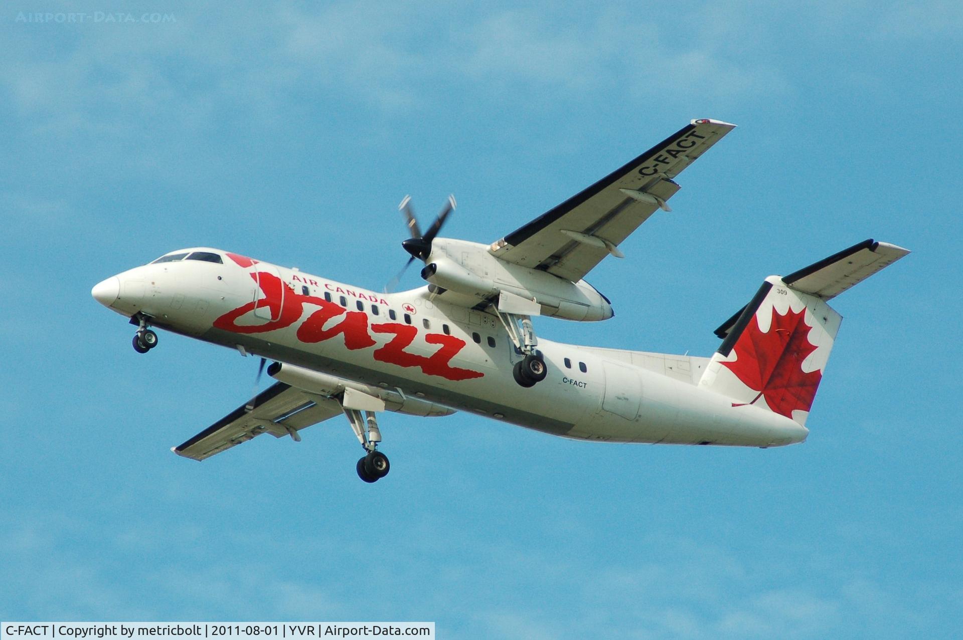 C-FACT, 1991 De Havilland Canada DHC-8-311 Dash 8 C/N 262, Landing on a bright, sunny day .