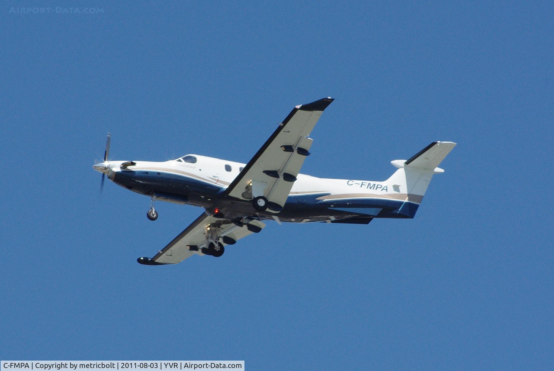 C-FMPA, 1996 Pilatus PC-12/45 C/N 164, Landing on a bright, sunny day .
