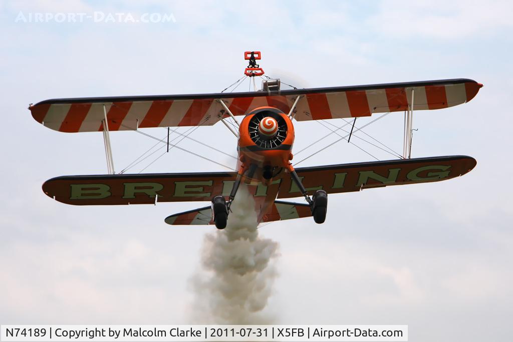 N74189, 1941 Boeing PT-17/R985 Kaydet (A75N1) C/N 75-717, Stearman PT-17 Kaydet leaves Fishburn Airfield to fly home following a refuelling stop after this years Sunderland Airshow.