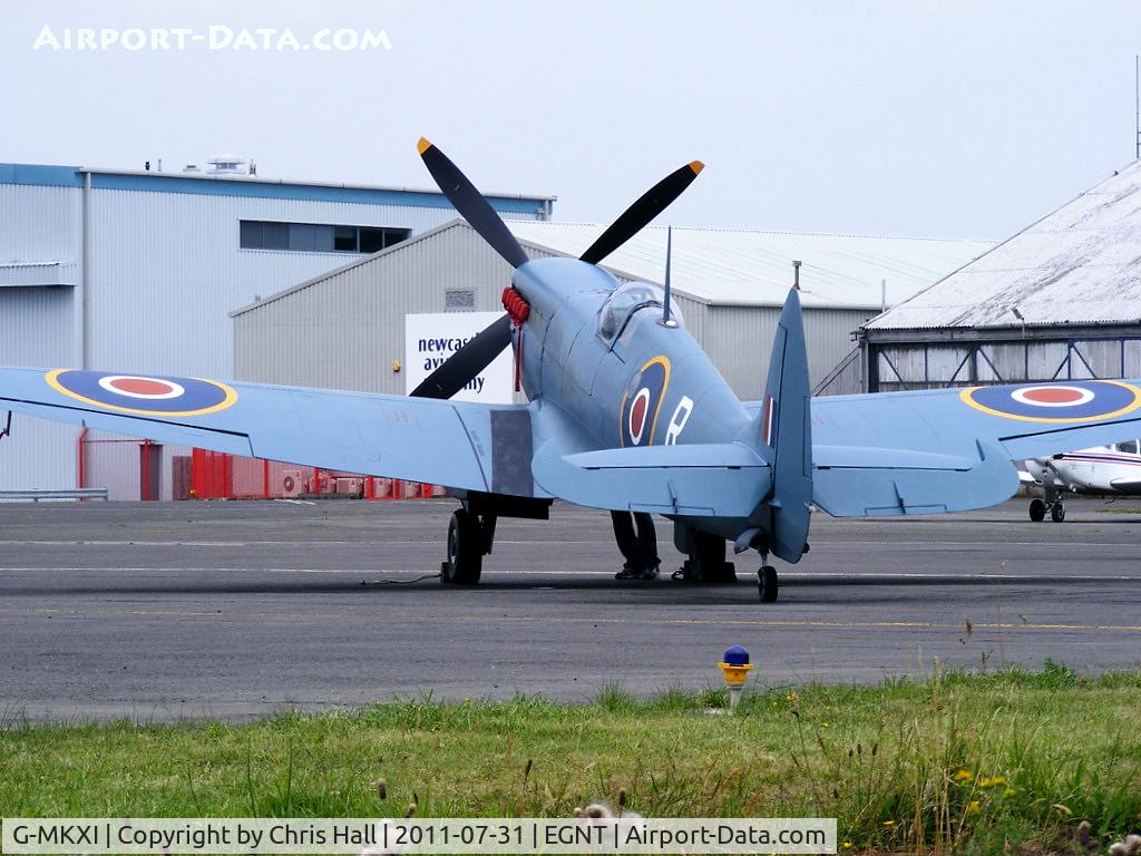G-MKXI, 1944 Supermarine 365 Spitfire PR.XI C/N 6S/504719, Hangar 11 Collection Spitfire PRXI in its new colour scheme, nolonger wearing D-Day invasion stripes and painted with Type C.1 roundels 