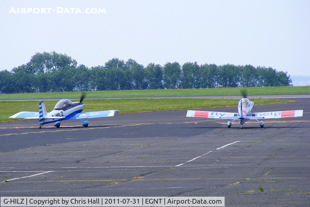 G-HILZ, 2006 Vans RV-8 C/N PFA 303-14471, with G-RVMZ of the RV8tors display team