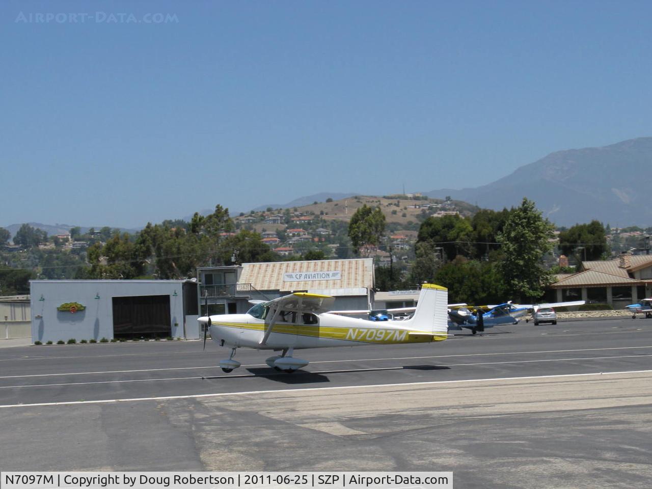 N7097M, 1958 Cessna 175 Skylark C/N 55397, 1958 Cessna 175 SKYLARK, Continental GO-300-E 175 Hp geared engine. 3,200 rpm crankshaft speed to 1.33/1 reduction gearing for 2,400 rpm cruise. Note deep cowling. Landing roll Rwy 22.