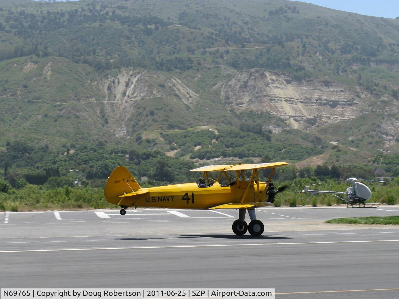 N69765, 1941 Boeing A75N1 (PT17) C/N 75-1044, 1941 Boeing Stearman A75N1 as Navy N2S1, Continental W670-5 220 Hp, landing roll rwy 22