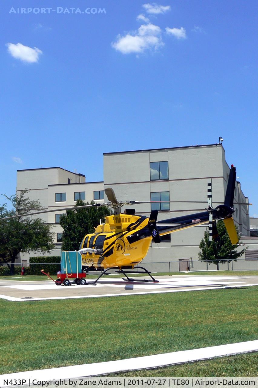 N433P, Bell 407 C/N 53861, On the pad at Medical Center of Arlington (with air conditioner attached...it's only 105 degrees out there)