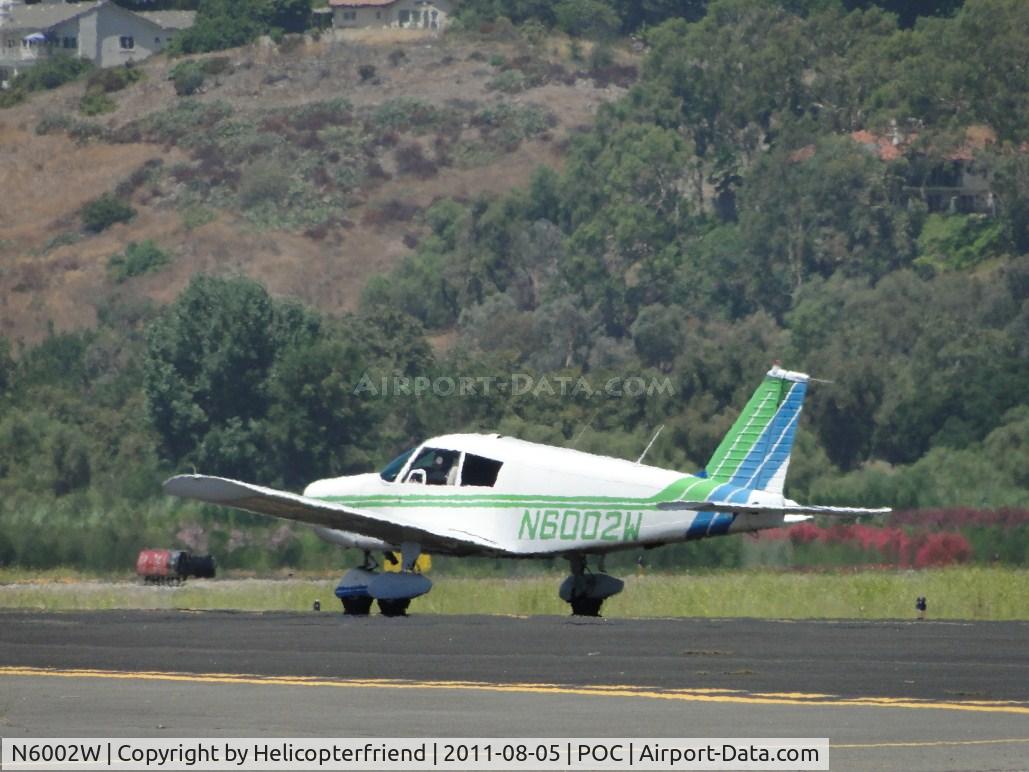 N6002W, 1964 Piper PA-28-140 C/N 28-20002, Taxiing to transient parking after landing on runway 26L