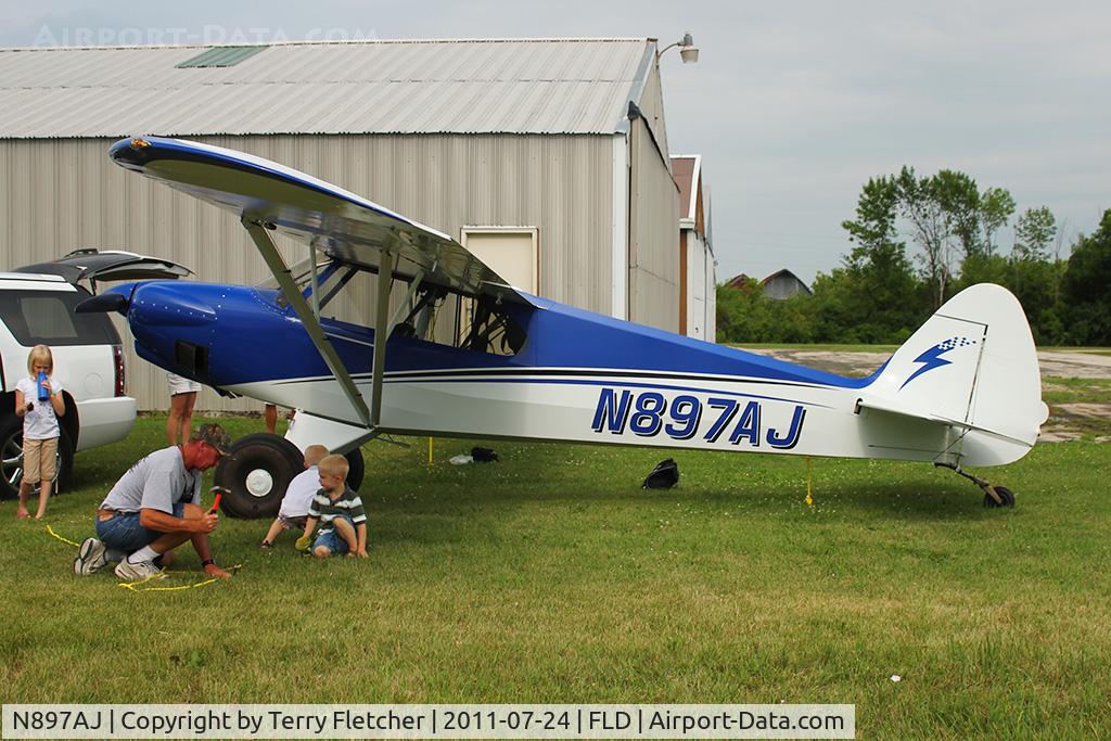 N897AJ, 2009 Cub Crafters CC11-100 Sport Cub C/N CC11-00108, 2009 Cub Crafters Inc CC11-100, c/n: CC11-00108 being secured for overnight parking at Fond du Lac