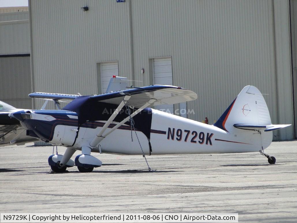 N9729K, 1947 Stinson 108-2 Voyager C/N 108-2729, Covered and parked south of the paint shop and west of Planes Of Fame area