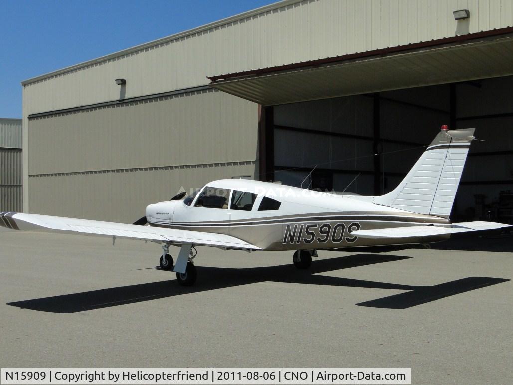 N15909, 1972 Piper PA-28R-200 C/N 28R-7335104, Parked near a hanger