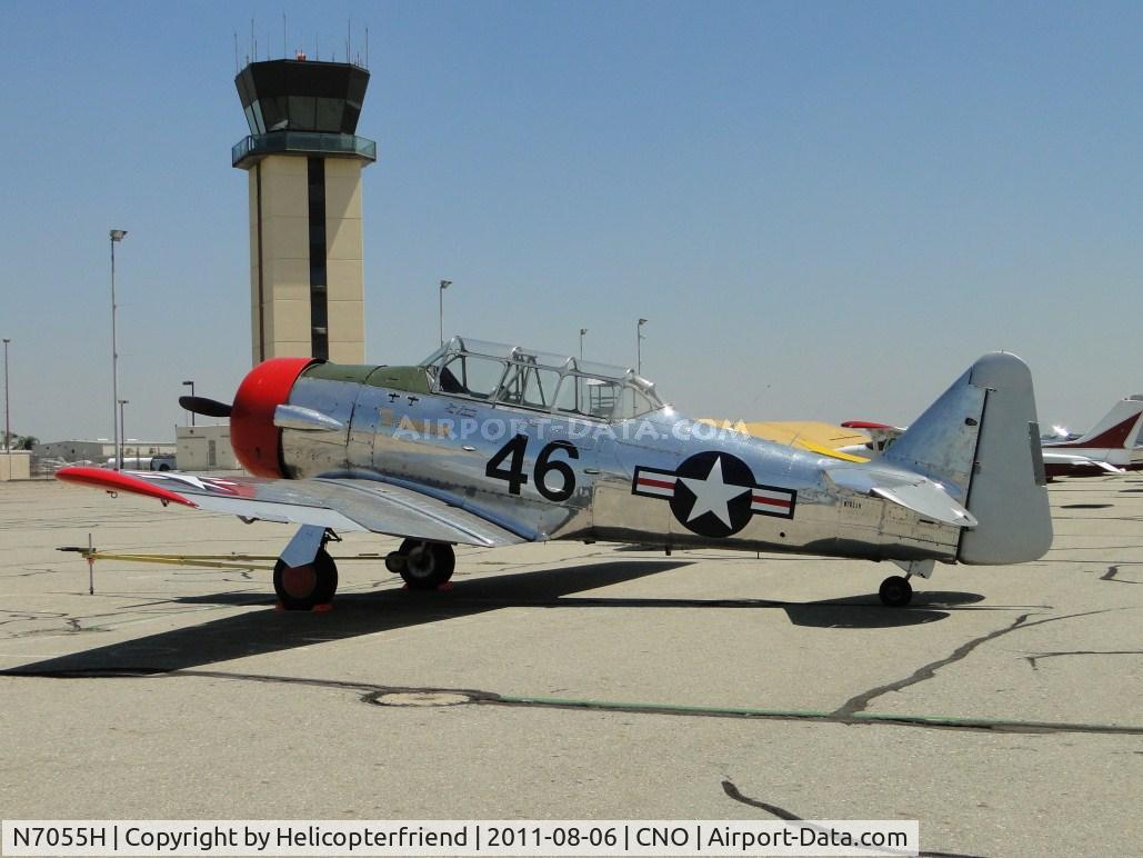 N7055H, North American AT-6C C/N 88-12150, Parked south and west of the Control Tower
