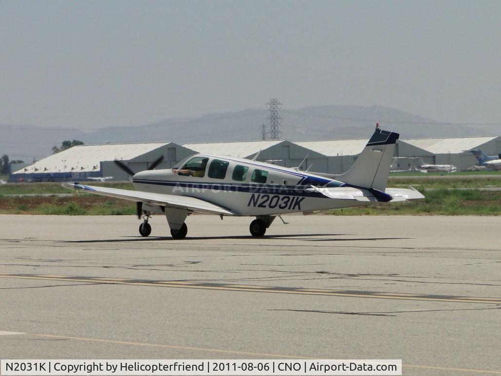 N2031K, 1978 Beech A36 Bonanza 36 C/N E-1352, Just landed on runway 26R and is taxiing back to the hanger