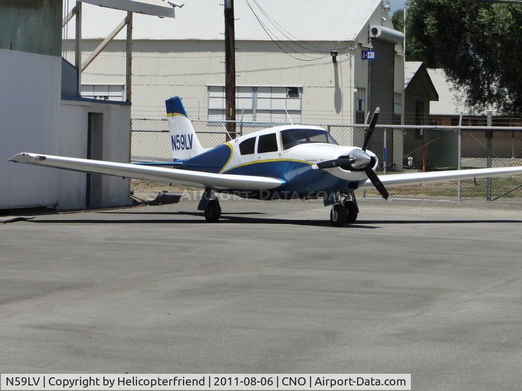 N59LV, 1959 Piper PA-24-250 Comanche C/N 24-1229, Parked backed into a corner at a hanger