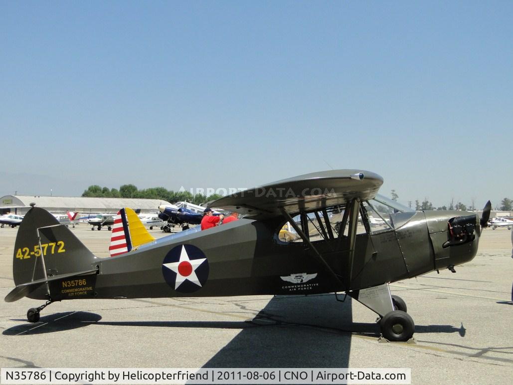 N35786, 1941 Piper J5A Cub Cruiser C/N 5-772, Parked to the rear of Yank's Air Museum area