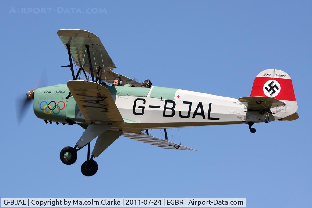 G-BJAL, 1957 Bucker 1-131E Jungmann C/N 1028, Another airfield resident Casa 1-131E Srs 1000 Jungmann 'flies by' at Breighton Airfield's Wings & Wheels Weekend, July 2011.