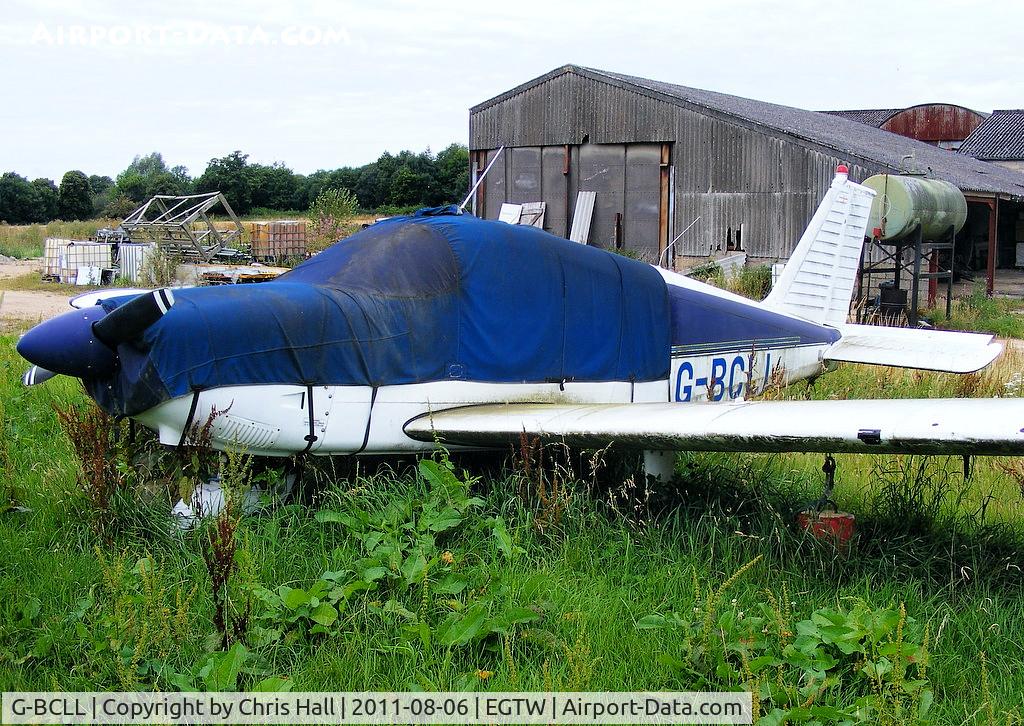 G-BCLL, 1965 Piper PA-28-180 Cherokee C C/N 28-2400, in the graveyard at Oaksey Park.