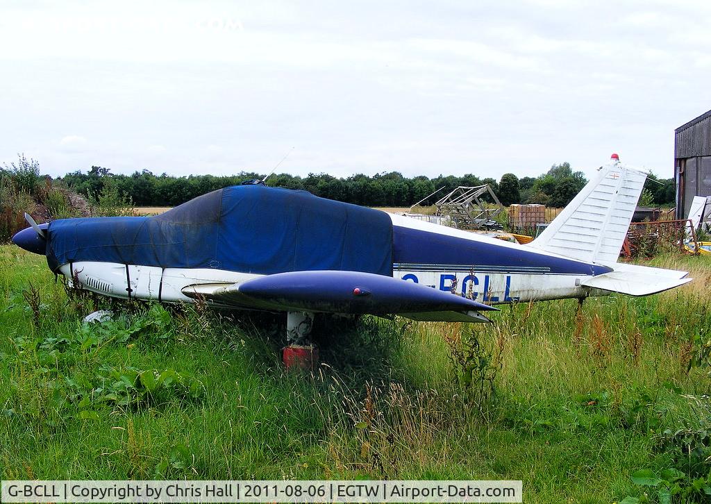 G-BCLL, 1965 Piper PA-28-180 Cherokee C C/N 28-2400, in the graveyard at Oaksey Park.
