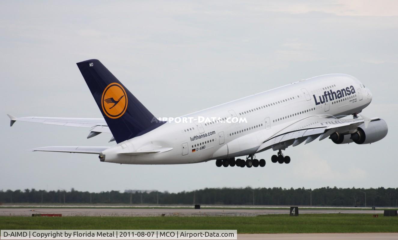 D-AIMD, 2010 Airbus A380-841 C/N 048, Lufthansa A380 lifts slowly after taking on 91,000 lbs of fuel in Orlando for the short hop to Miami after Miami thunderstorms caused it to divert here.