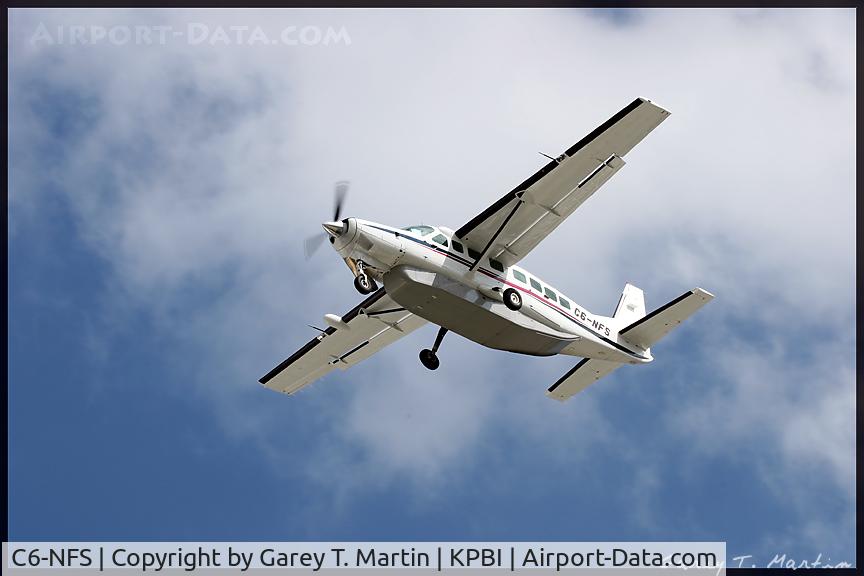 C6-NFS, Cessna 208B Caravan C/N 208B0994, Short approach at 27L in PBI.