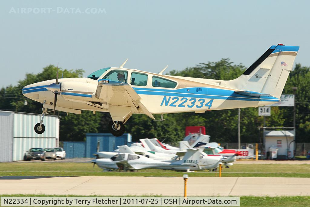 N22334, 1977 Beech E-55 Baron C/N TE-1111, 1977 Beech E-55, c/n: TE-1111 arriving at 2011 Oshkosh