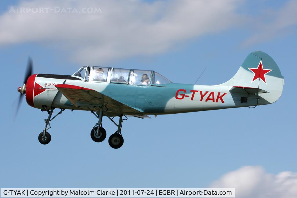 G-TYAK, 1989 Bacau Yak-52 C/N 899907, Airfield resident Bacau Yak-52 performs during Breighton Airfield's Wings & Wheels Weekend, July 2011.
