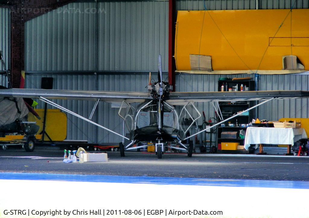 G-STRG, 2001 Cyclone AX2000 C/N 7837, hangared at Kemble