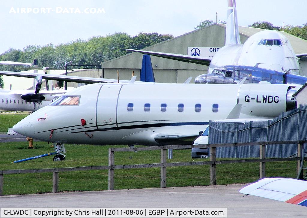 G-LWDC, 1984 Canadair Challenger 601 (CL-600-2A12) C/N 3031, although partially hidden by the building, this Challenger is now sporting a new paint job