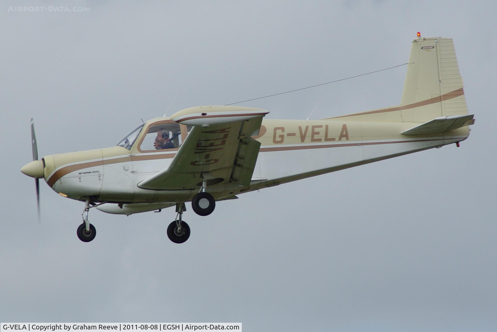 G-VELA, 1968 SIAI-Marchetti S-205-22R C/N 4-149, About to touch down.