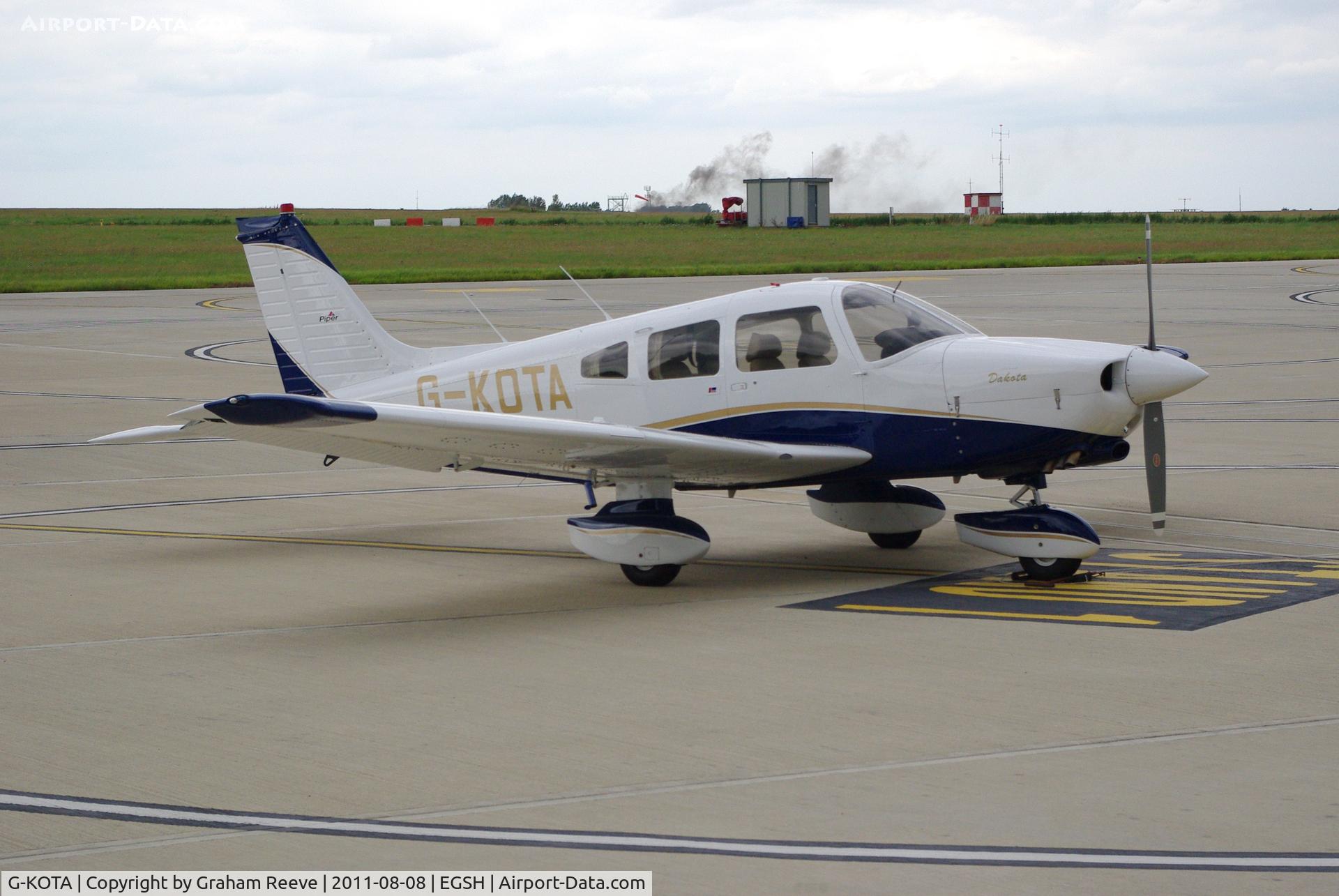 G-KOTA, 1980 Piper PA-28-236 Dakota C/N 28-8011044, Parked at Norwich.