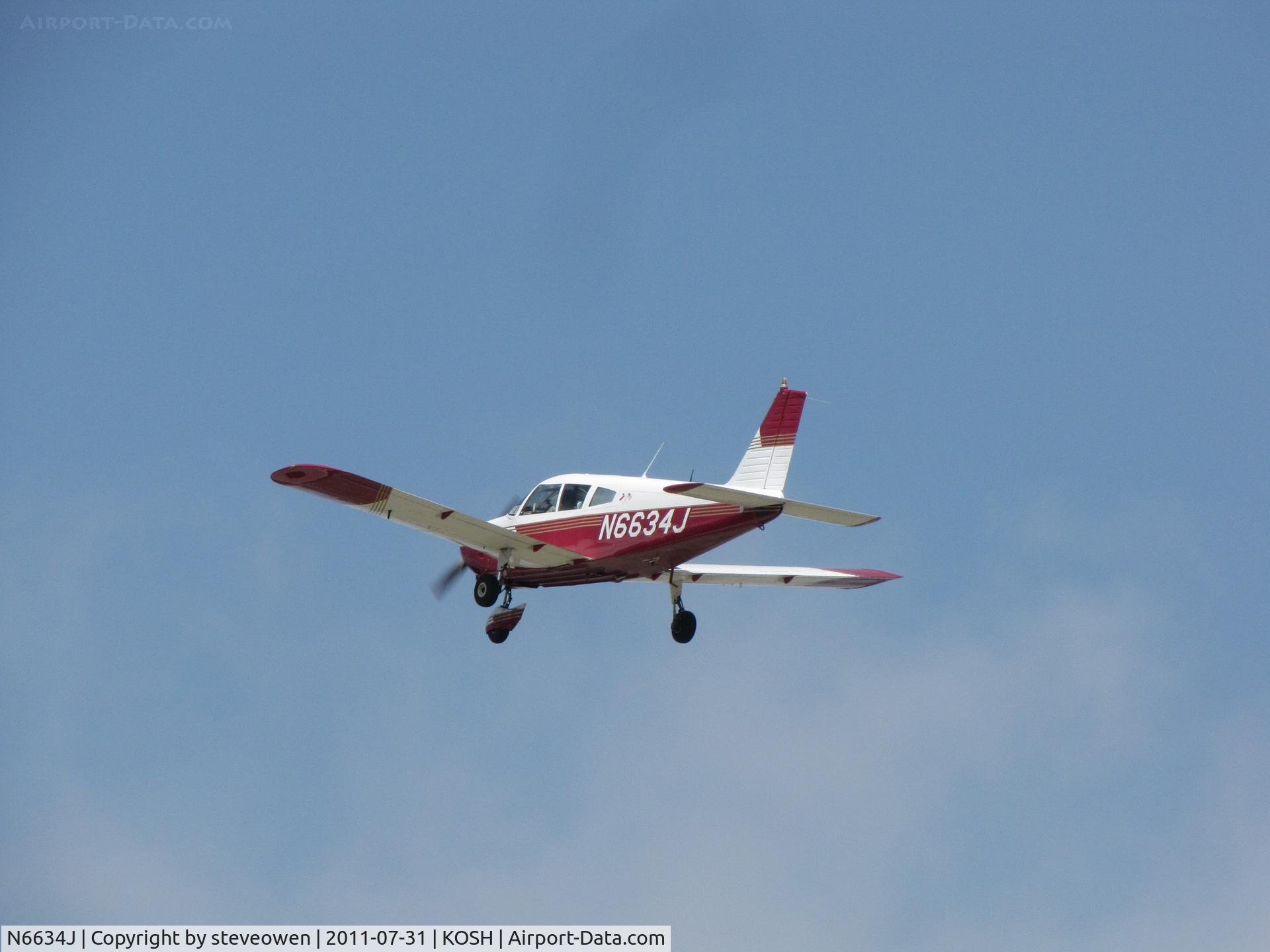 N6634J, 1968 Piper PA-28-180 Cherokee C/N 28-5101, Departing runway 27 Oshkosh airshow 2011